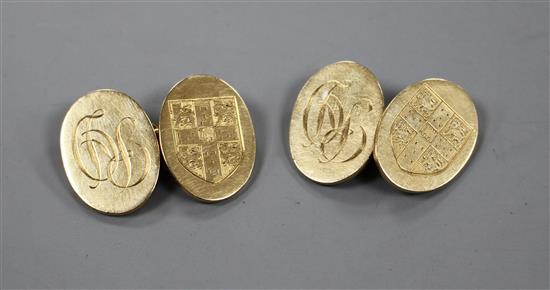 A pair of 1960s 9ct gold engraved oval cufflinks.